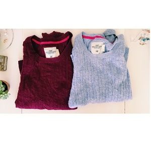 Pair of H&M sweaters